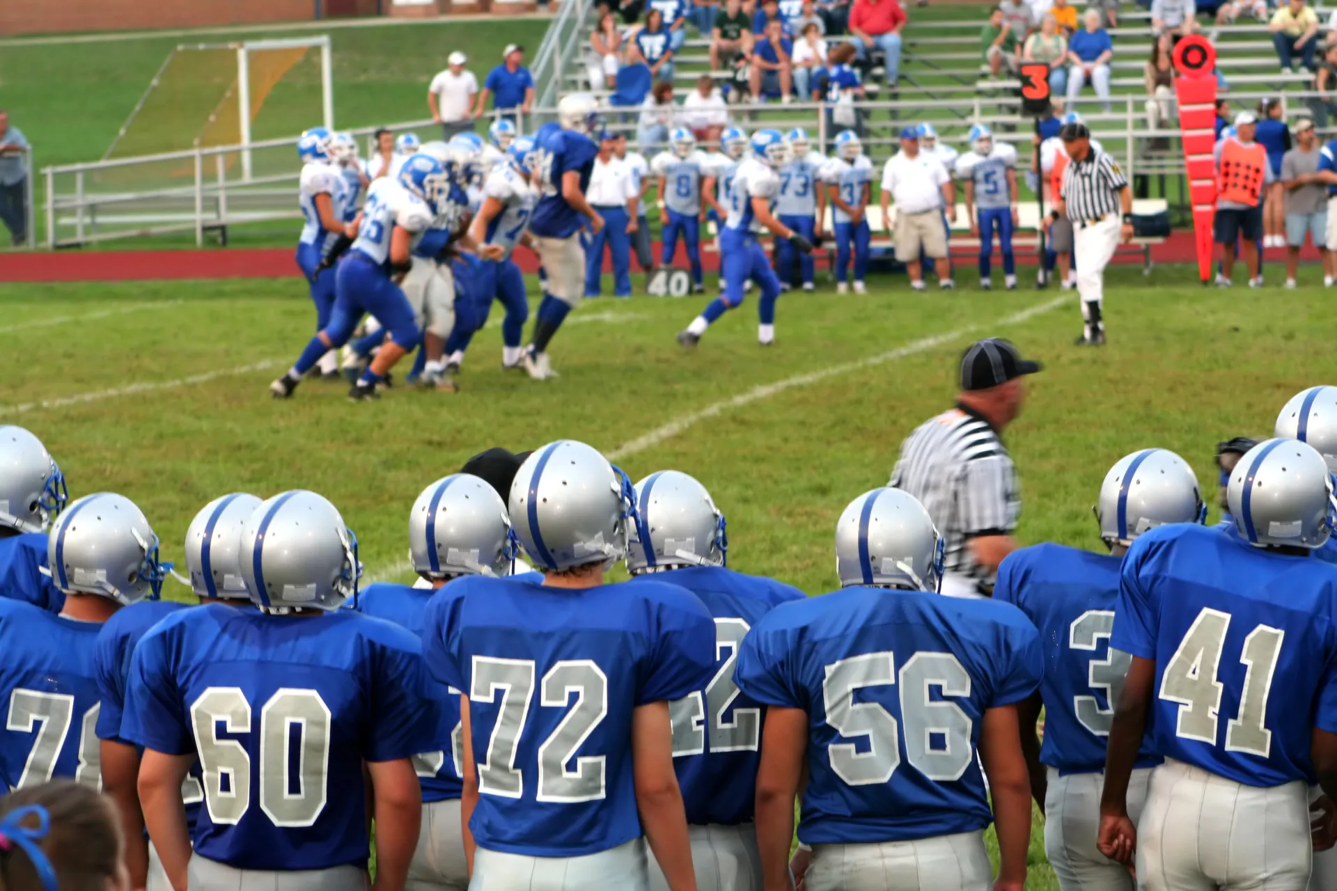 Teen football players on the field