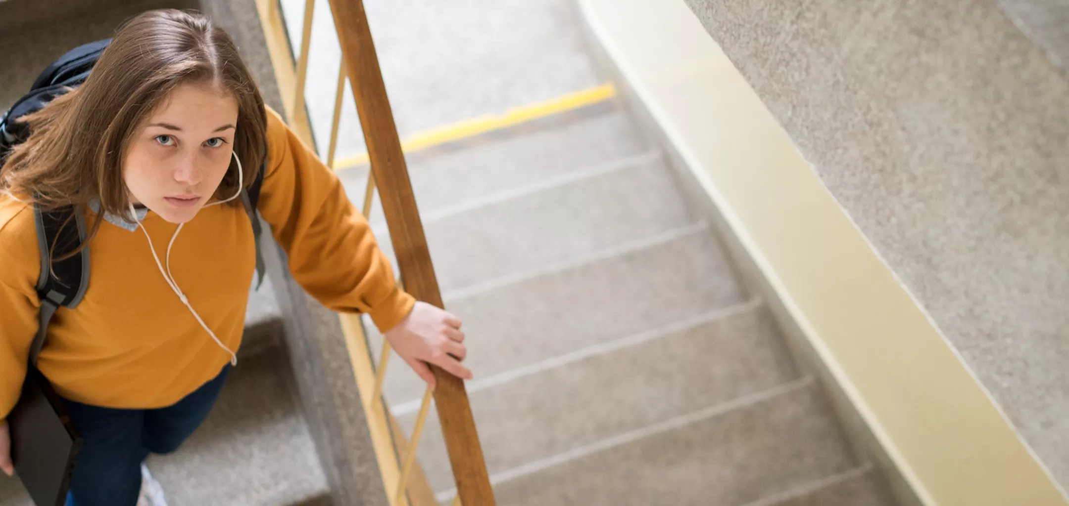 High school student in stairwell