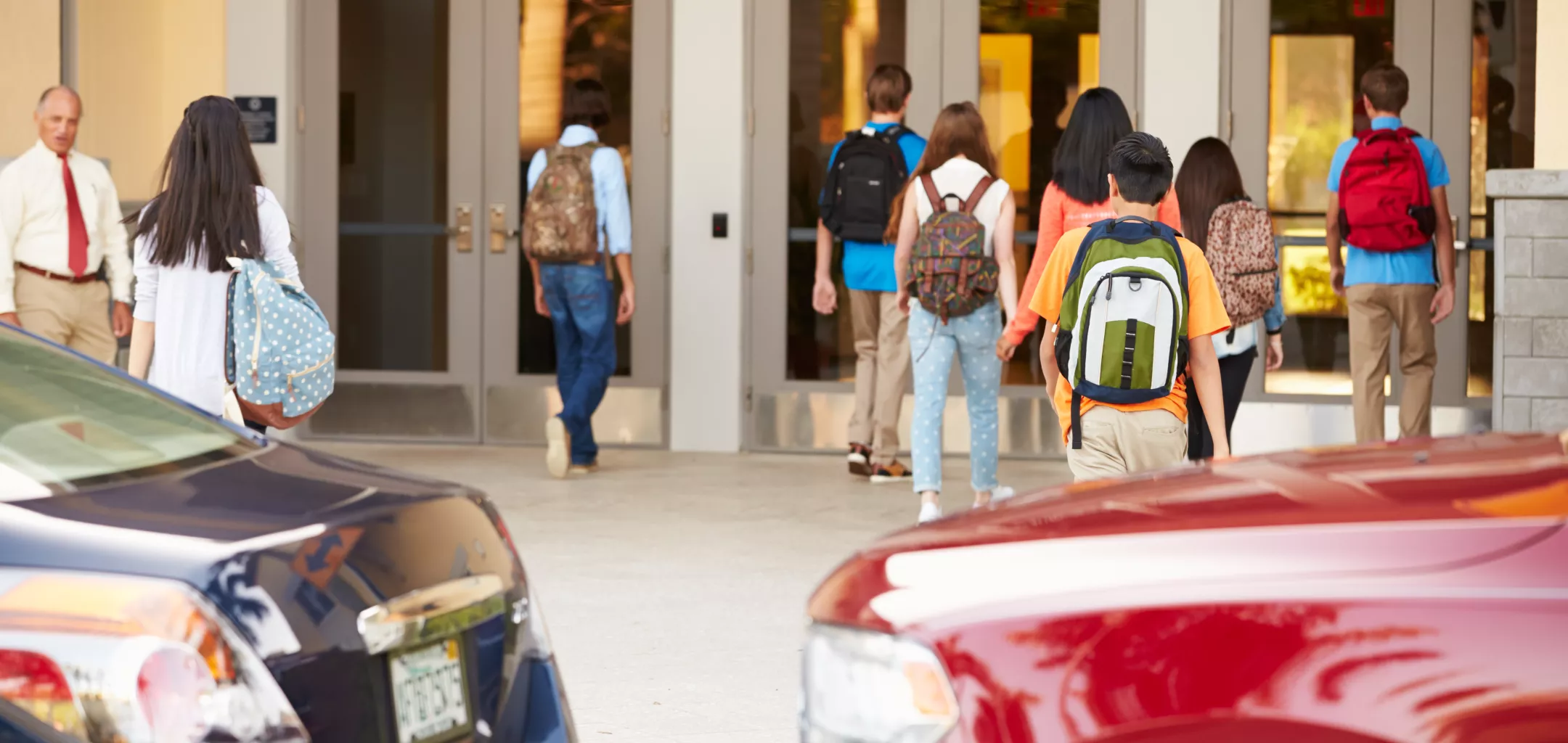 High school students arriving at school