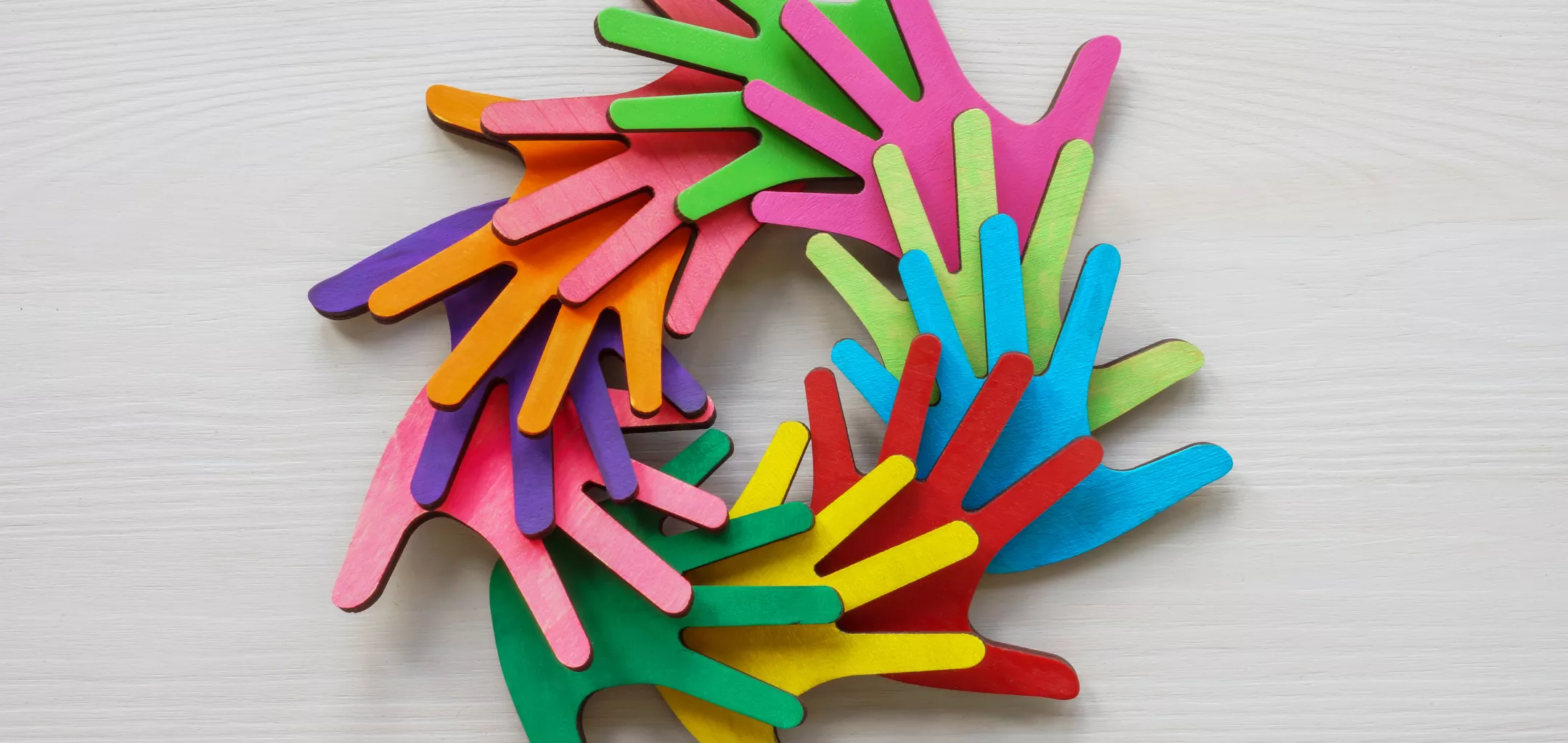 colorful hands joined together 